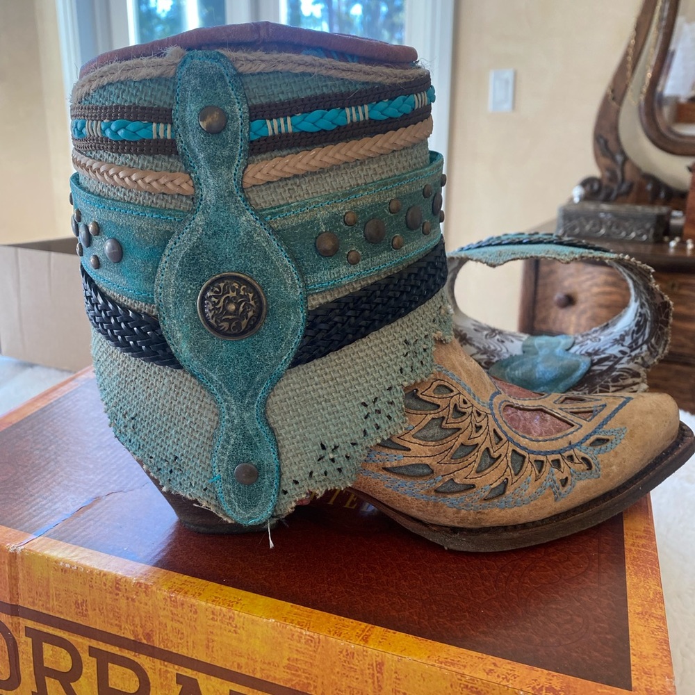 Corral women’s booties. Sleeve comes off so you can have 2 different looks.